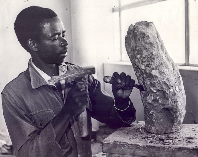 Joseph Ndandarika chiseling stone