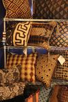 A display of one of a kind Kuba Cloth Pillows