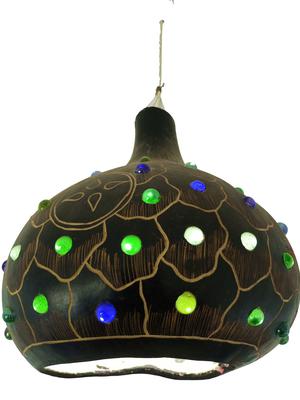 African Gourd Lampshade is a fascinating colorful lampshade handcrafted from a dry gourd guard.