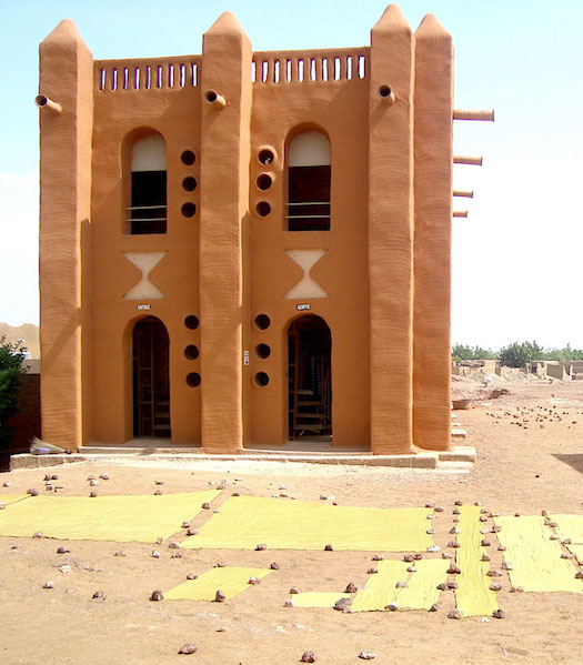 Yellow dyed cloths drying in the sun, Segou